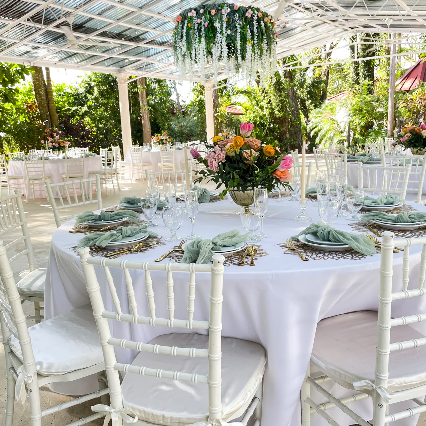 Botanical Spring Wedding featuring a floral chandelier at Miami wedding venue